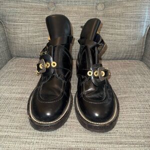 Balenciaga Black Leather Combat Moto Boots with Gold Hardware